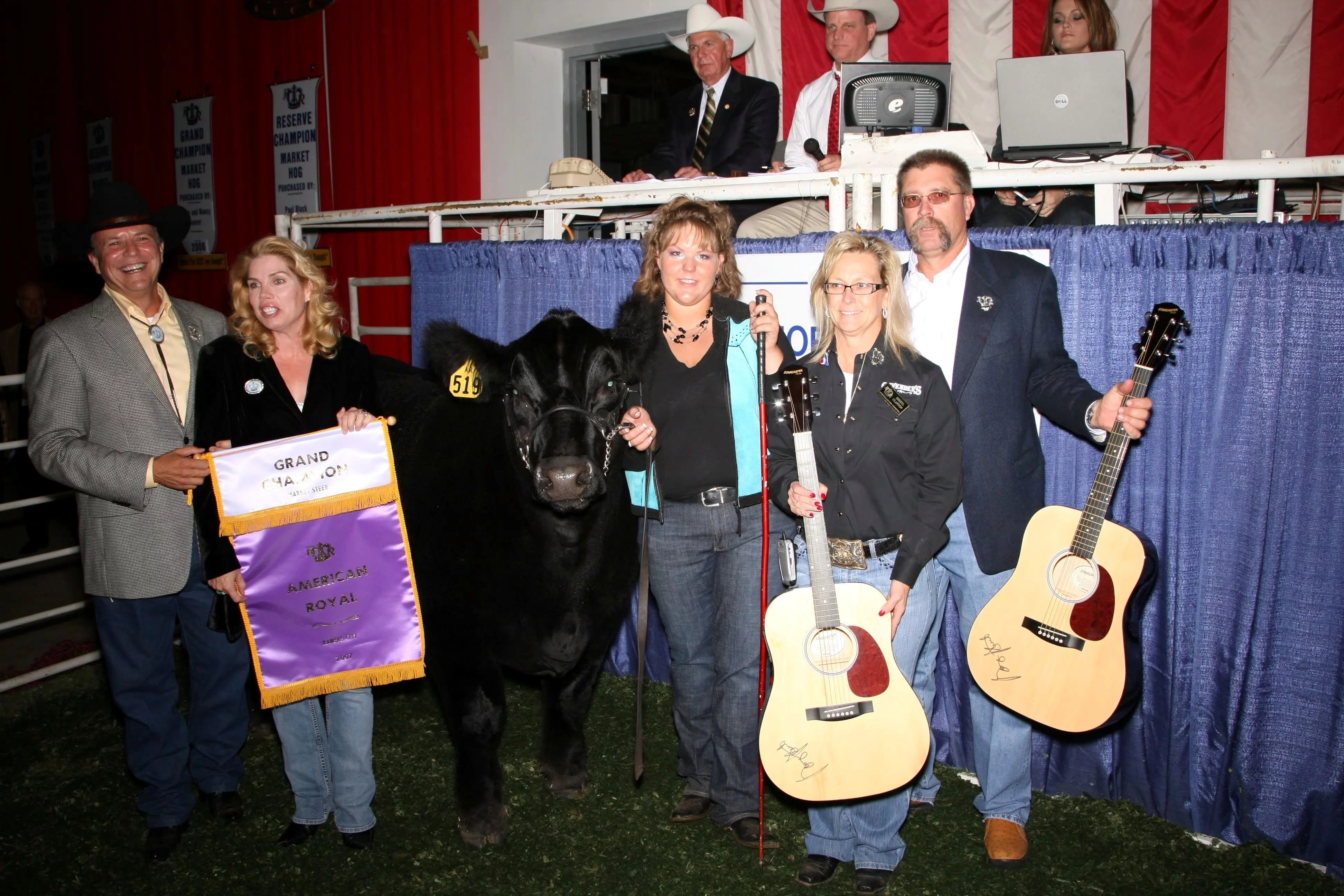 People near the bull