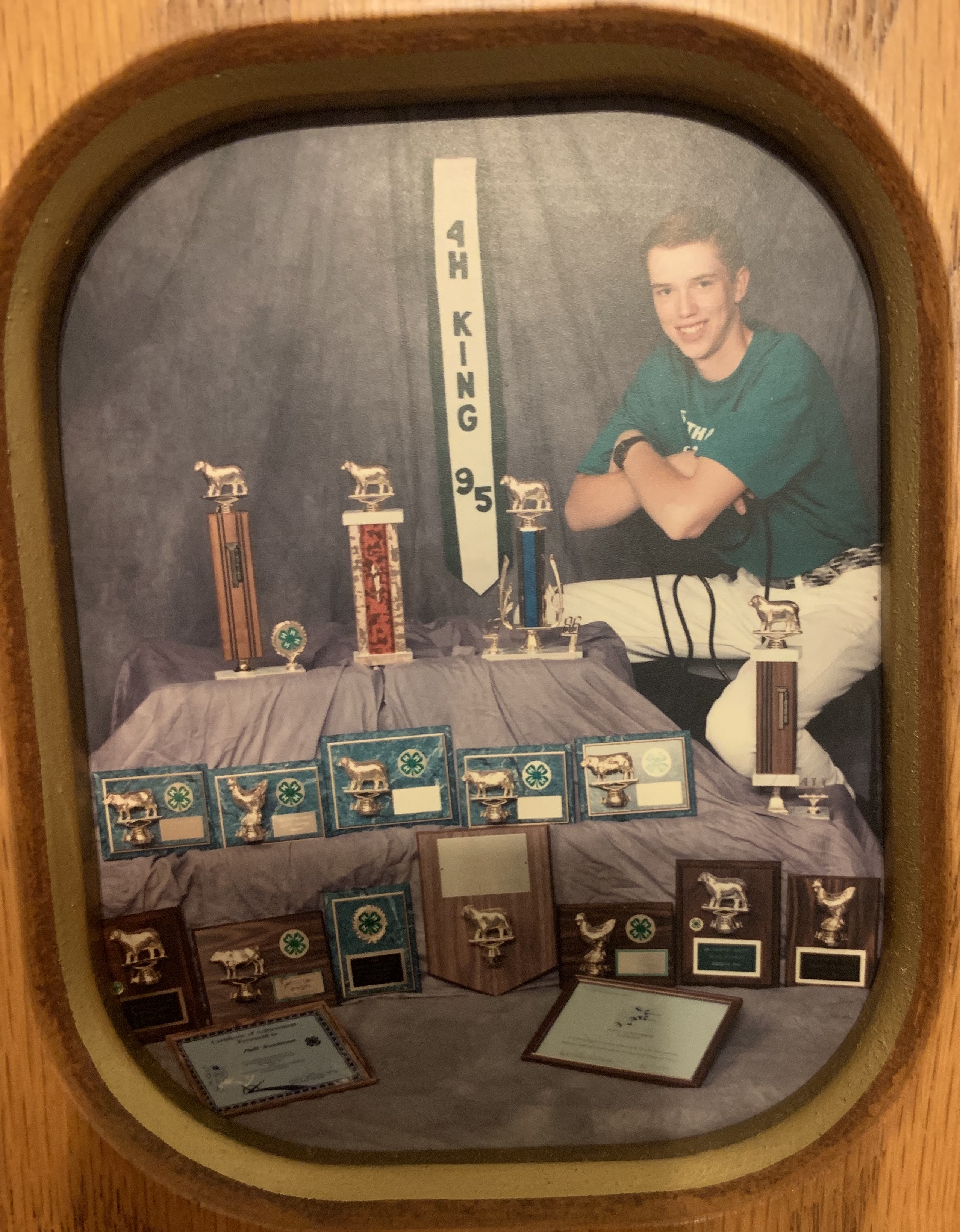 Photo of a man with awards