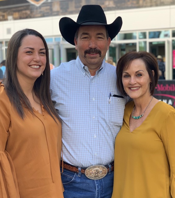 Photo of a man and two girls