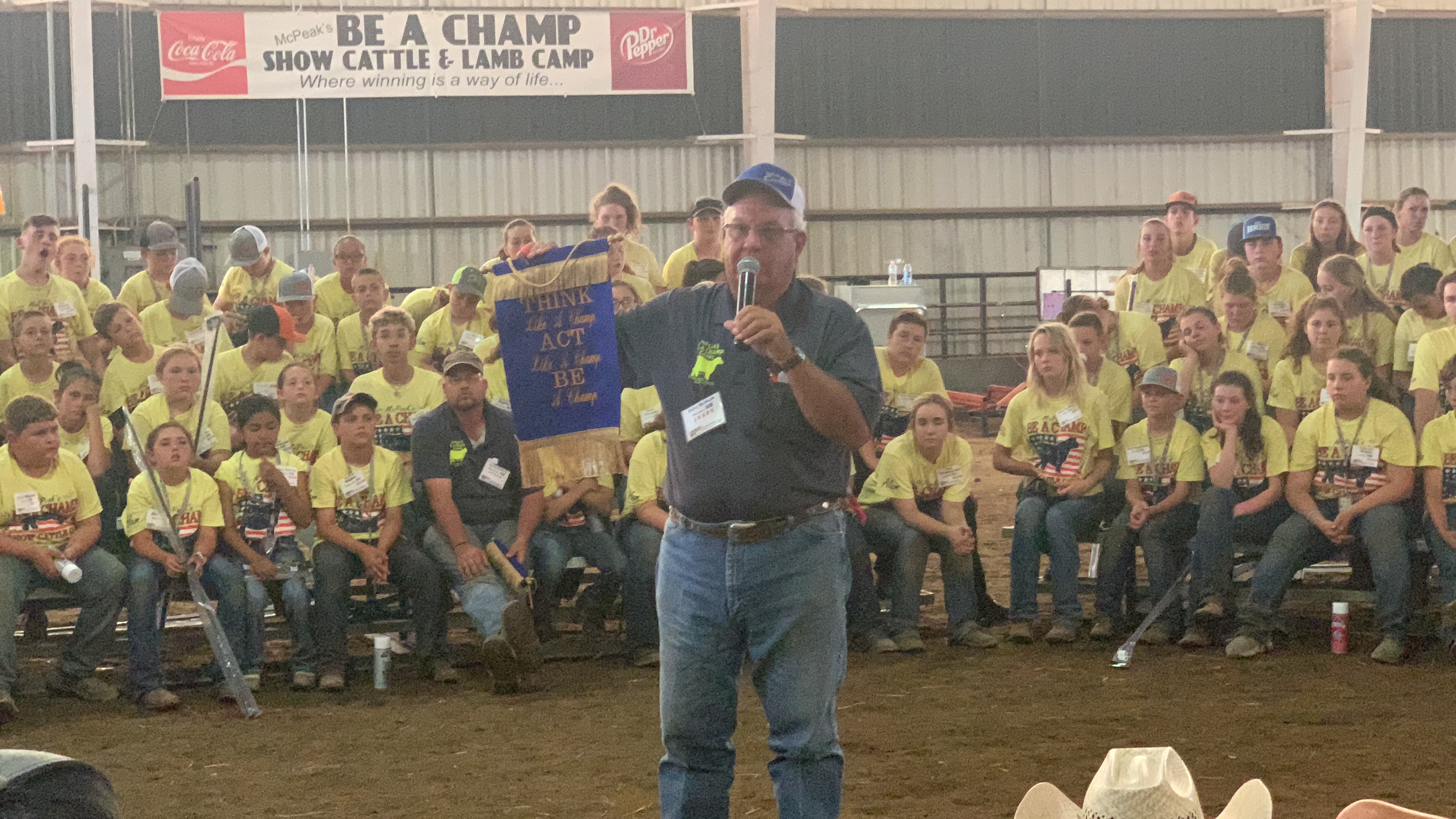 man speaks to people